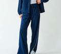 Blue track pants